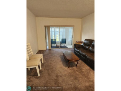 Updated 1st floor condo with golf course views on 5th green on Leisureville Community Association in Florida - for sale on GolfHomes.com, golf home, golf lot