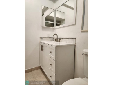 Updated 1st floor condo with golf course views on 5th green on Leisureville Community Association in Florida - for sale on GolfHomes.com, golf home, golf lot