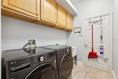 Exquisite Golf Course Living at 13049 Thoroughbred Drive, Dade on Lake Jovita Golf and Country Club in Florida - for sale on GolfHomes.com, golf home, golf lot