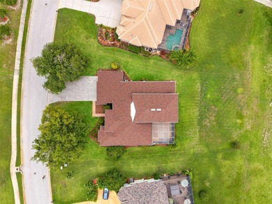 Exquisite Golf Course Living at 13049 Thoroughbred Drive, Dade on Lake Jovita Golf and Country Club in Florida - for sale on GolfHomes.com, golf home, golf lot