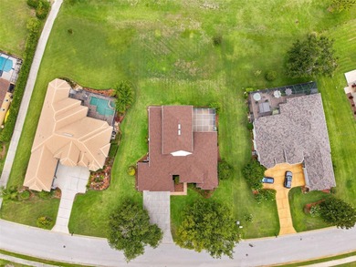 Exquisite Golf Course Living at 13049 Thoroughbred Drive, Dade on Lake Jovita Golf and Country Club in Florida - for sale on GolfHomes.com, golf home, golf lot