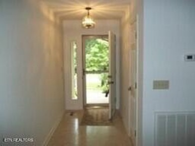 Nice three bedroom, two bath home with two car garage on Druid Hills Golf Club in Tennessee - for sale on GolfHomes.com, golf home, golf lot