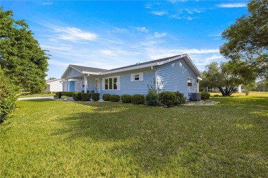 PRICE IMPROVEMENT ON THIS UNIQUE MAPLE MODEL, being offered as on The Links of Spruce Creek in Florida - for sale on GolfHomes.com, golf home, golf lot
