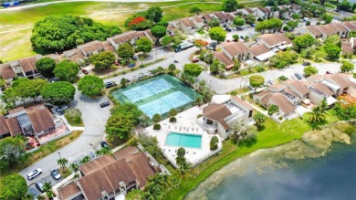 Discover this incredible property with breathtaking lake views on Fontainebleau Golf Course in Florida - for sale on GolfHomes.com, golf home, golf lot