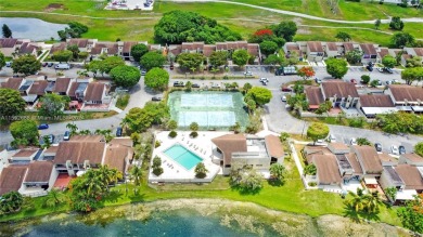 Discover this incredible property with breathtaking lake views on Fontainebleau Golf Course in Florida - for sale on GolfHomes.com, golf home, golf lot