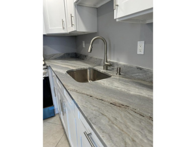 Beautifully Renovated Unit withNew White Shaker Style Kitchen on Addison Reserve in Florida - for sale on GolfHomes.com, golf home, golf lot