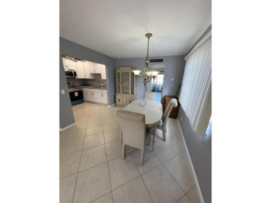 Beautifully Renovated Unit withNew White Shaker Style Kitchen on Addison Reserve in Florida - for sale on GolfHomes.com, golf home, golf lot