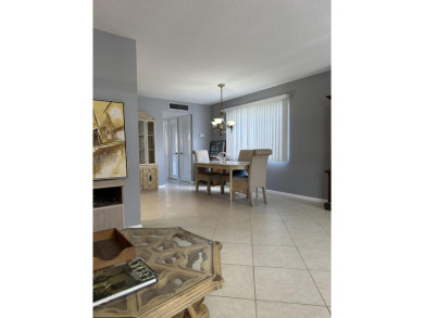 Beautifully Renovated Unit withNew White Shaker Style Kitchen on Addison Reserve in Florida - for sale on GolfHomes.com, golf home, golf lot