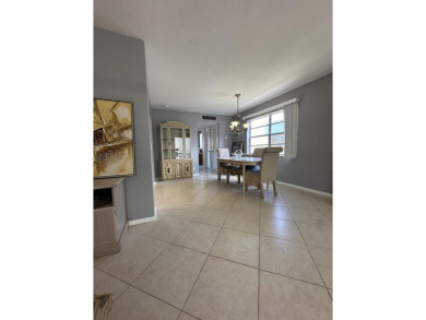 Beautifully Renovated Unit withNew White Shaker Style Kitchen on Addison Reserve in Florida - for sale on GolfHomes.com, golf home, golf lot