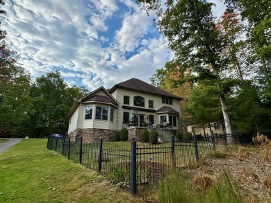 Elegant two-story home perfectly positioned on the #4 hole of on Glade Springs Resort Golf Course in West Virginia - for sale on GolfHomes.com, golf home, golf lot