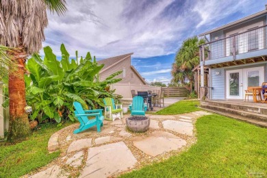 Welcome to this stunning home in the Santa Rosa Shores Canal on Tiger Point Golf and Country Club in Florida - for sale on GolfHomes.com, golf home, golf lot