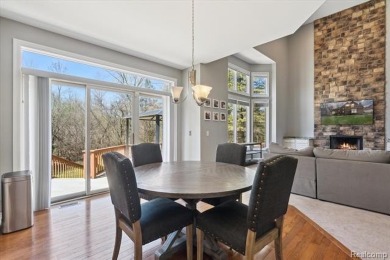 Step into this stunning 4-bedroom brick colonial located in the on Oakhurst Golf and Country Club in Michigan - for sale on GolfHomes.com, golf home, golf lot