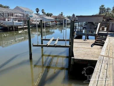 Welcome to this stunning home in the Santa Rosa Shores Canal on Tiger Point Golf and Country Club in Florida - for sale on GolfHomes.com, golf home, golf lot