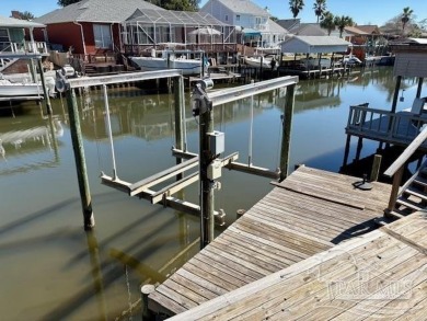 Welcome to this stunning home in the Santa Rosa Shores Canal on Tiger Point Golf and Country Club in Florida - for sale on GolfHomes.com, golf home, golf lot