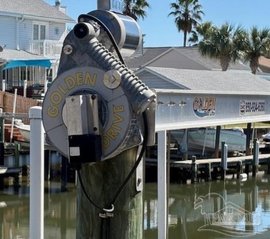 Welcome to this stunning home in the Santa Rosa Shores Canal on Tiger Point Golf and Country Club in Florida - for sale on GolfHomes.com, golf home, golf lot