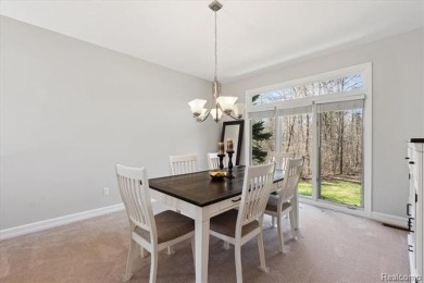Step into this stunning 4-bedroom brick colonial located in the on Oakhurst Golf and Country Club in Michigan - for sale on GolfHomes.com, golf home, golf lot