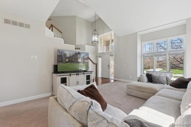 Step into this stunning 4-bedroom brick colonial located in the on Oakhurst Golf and Country Club in Michigan - for sale on GolfHomes.com, golf home, golf lot