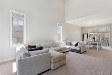 Step into this stunning 4-bedroom brick colonial located in the on Oakhurst Golf and Country Club in Michigan - for sale on GolfHomes.com, golf home, golf lot