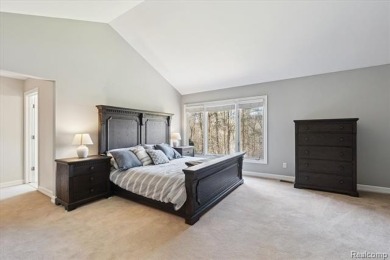 Step into this stunning 4-bedroom brick colonial located in the on Oakhurst Golf and Country Club in Michigan - for sale on GolfHomes.com, golf home, golf lot