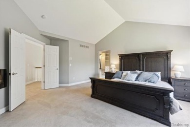 Step into this stunning 4-bedroom brick colonial located in the on Oakhurst Golf and Country Club in Michigan - for sale on GolfHomes.com, golf home, golf lot
