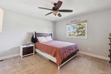 Step into this stunning 4-bedroom brick colonial located in the on Oakhurst Golf and Country Club in Michigan - for sale on GolfHomes.com, golf home, golf lot