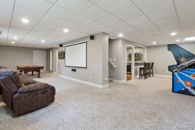 Step into this stunning 4-bedroom brick colonial located in the on Oakhurst Golf and Country Club in Michigan - for sale on GolfHomes.com, golf home, golf lot