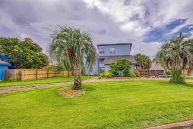 Welcome to this stunning home in the Santa Rosa Shores Canal on Tiger Point Golf and Country Club in Florida - for sale on GolfHomes.com, golf home, golf lot