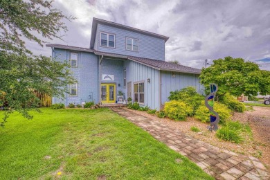 Welcome to this stunning home in the Santa Rosa Shores Canal on Tiger Point Golf and Country Club in Florida - for sale on GolfHomes.com, golf home, golf lot