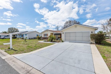 This beautifully maintained 3/2 Holly model is packed with on Nancy Lopez Legacy Golf and Country Club in Florida - for sale on GolfHomes.com, golf home, golf lot