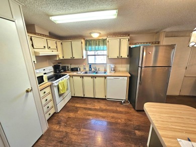 This 2 bedroom 2 bath home is ready for immediate occupancy! on Pine Lakes Country Club in Florida - for sale on GolfHomes.com, golf home, golf lot