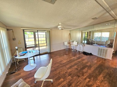 This 2 bedroom 2 bath home is ready for immediate occupancy! on Pine Lakes Country Club in Florida - for sale on GolfHomes.com, golf home, golf lot