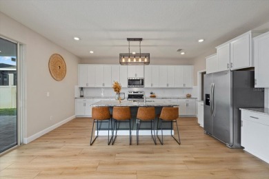 Discover the exquisite D.R. Horton's Jordyn Model home in the on Lakewood National Golf Club in Florida - for sale on GolfHomes.com, golf home, golf lot