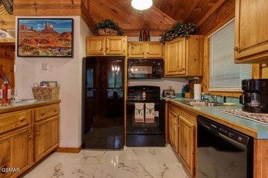 Stunning ''Lakota Wolf'' Cabin Retreat in Sevierville, TN - on Sevierville Golf Club in Tennessee - for sale on GolfHomes.com, golf home, golf lot