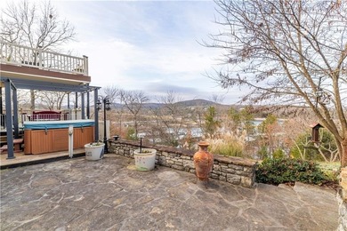 Enjoy stunning views of Table Rock Lake from the upper deck on Holiday Island Executive Golf Course in Arkansas - for sale on GolfHomes.com, golf home, golf lot