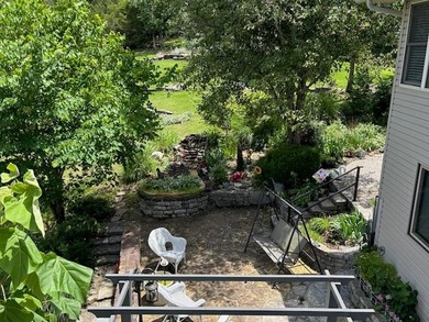 Enjoy stunning views of Table Rock Lake from the upper deck on Holiday Island Executive Golf Course in Arkansas - for sale on GolfHomes.com, golf home, golf lot