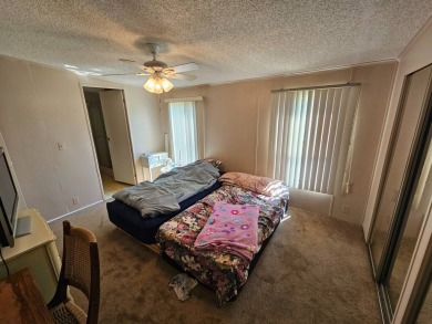 This 2 bedroom 2 bath home is ready for immediate occupancy! on Pine Lakes Country Club in Florida - for sale on GolfHomes.com, golf home, golf lot