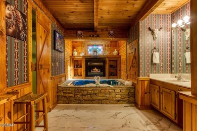 Stunning ''Lakota Wolf'' Cabin Retreat in Sevierville, TN - on Sevierville Golf Club in Tennessee - for sale on GolfHomes.com, golf home, golf lot