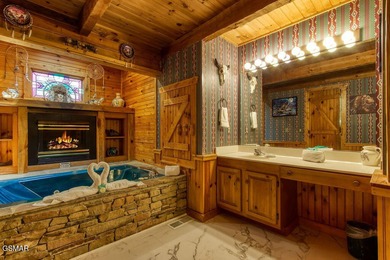 Stunning ''Lakota Wolf'' Cabin Retreat in Sevierville, TN - on Sevierville Golf Club in Tennessee - for sale on GolfHomes.com, golf home, golf lot