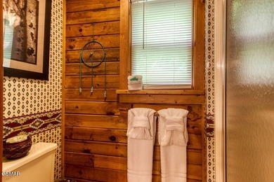 Stunning ''Lakota Wolf'' Cabin Retreat in Sevierville, TN - on Sevierville Golf Club in Tennessee - for sale on GolfHomes.com, golf home, golf lot