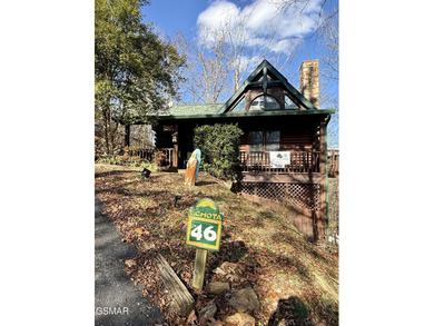 Stunning ''Lakota Wolf'' Cabin Retreat in Sevierville, TN - on Sevierville Golf Club in Tennessee - for sale on GolfHomes.com, golf home, golf lot