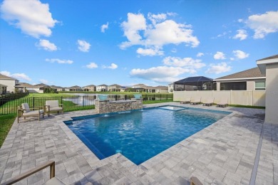 Discover the exquisite D.R. Horton's Jordyn Model home in the on Lakewood National Golf Club in Florida - for sale on GolfHomes.com, golf home, golf lot