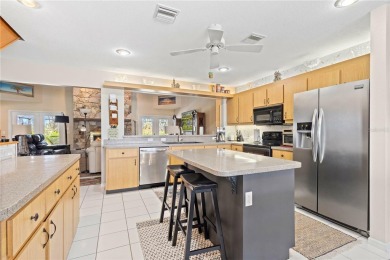 The SECOND building is perfectly designed to be used as a rental on Pinemoor West Golf Club in Florida - for sale on GolfHomes.com, golf home, golf lot