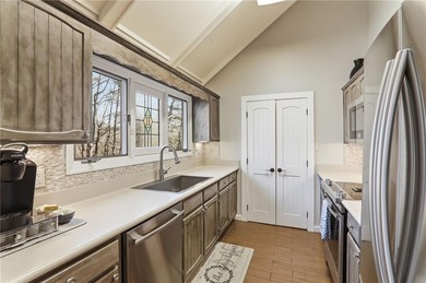 Beautifully maintained top-floor, end-unit condominium located on Big Canoe Golf Club - Cherokee in Georgia - for sale on GolfHomes.com, golf home, golf lot