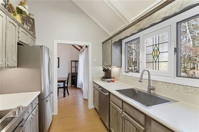 Beautifully maintained top-floor, end-unit condominium located on Big Canoe Golf Club - Cherokee in Georgia - for sale on GolfHomes.com, golf home, golf lot