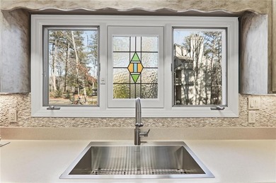 Beautifully maintained top-floor, end-unit condominium located on Big Canoe Golf Club - Cherokee in Georgia - for sale on GolfHomes.com, golf home, golf lot