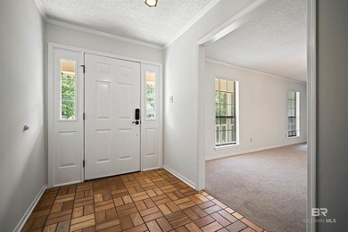 Welcome home to this lovely 3 bedroom 2 bathroom brick ranch on on Lake Forest Yacht and Country Club in Alabama - for sale on GolfHomes.com, golf home, golf lot