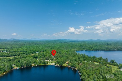 Welcome to 4 Back Bay! This charming lake house is nestled in a on Saranac Inn Golf and Country Club in New York - for sale on GolfHomes.com, golf home, golf lot