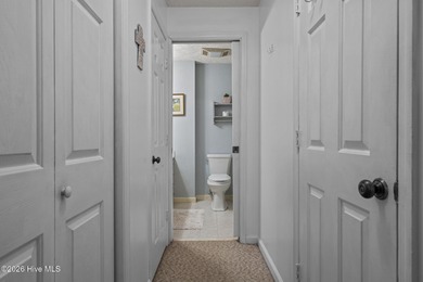 Nestled beneath a canopy of mature longleaf pines, this charming on Hyland Golf Club in North Carolina - for sale on GolfHomes.com, golf home, golf lot