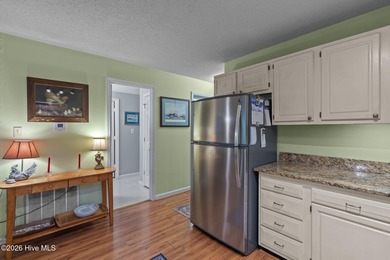 Nestled beneath a canopy of mature longleaf pines, this charming on Hyland Golf Club in North Carolina - for sale on GolfHomes.com, golf home, golf lot