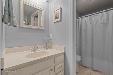 Nestled beneath a canopy of mature longleaf pines, this charming on Hyland Golf Club in North Carolina - for sale on GolfHomes.com, golf home, golf lot